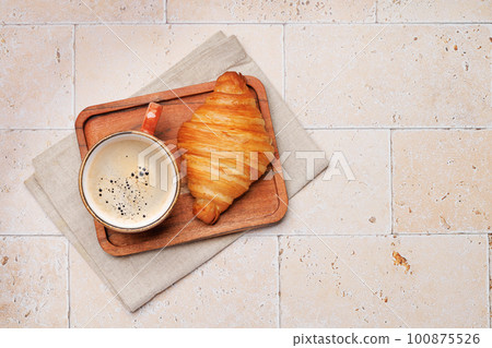 Coffee cup and croissant Coffee cup and croissant 100875526