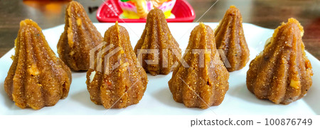 Modak for Ganesh Festival made from Milk and Sugar offered to God Ganesh during the festival season Modak for Ganesh Festival made from Milk and Sugar offered to God Ganesh during the festival season 100876749