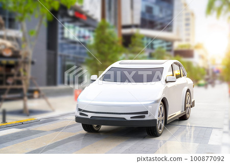 Ev car or electric vehicle drive in town with cityscape background 100877092
