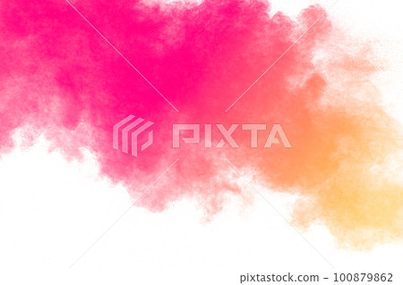Orange and yellow powder explosion on white background. Freeze motion of orange yellow dust particles splash. Orange and yellow powder explosion on white background. Freeze motion of orange yellow dust particles splash. 100879862