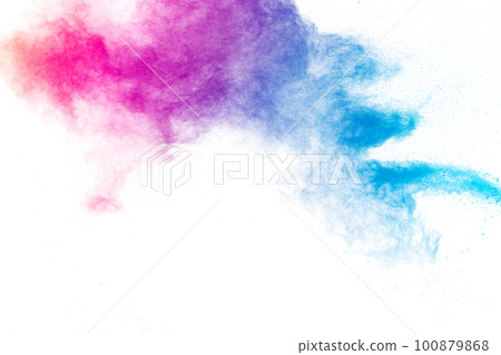 Multi colour powder explosion on white background. Launched colourful dust particles splashing. Multi colour powder explosion on white background. Launched colourful dust particles splashing. 100879868