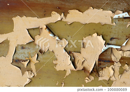 Flaking paint from the metal surface Flaking paint from the metal surface 100880089