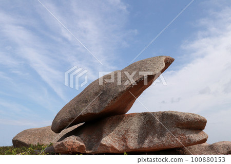 Bizarre boulders and rocks on the Pink Granite Coast on the island of Renote in Brittany Bizarre boulders and rocks on the Pink Granite Coast on the island of Renote in Brittany 100880153