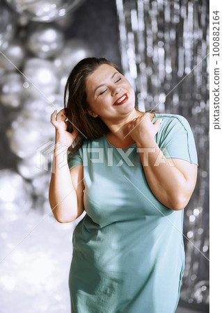 Portrait of the playful plus size model Portrait of the playful plus size model 100882164