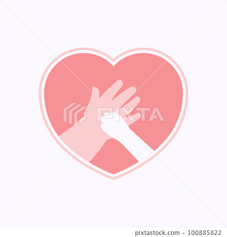 Paw on hand of kid in heart shaped frame 100885822