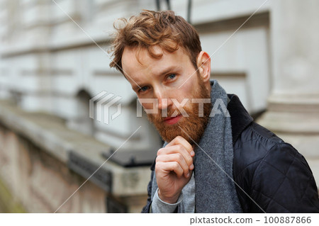 Street portrait of a thoughtful bearded man Street portrait of a thoughtful bearded man 100887866