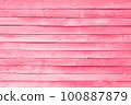 Trendy color of the year 2023. Wooden planks boards, gorizontal pattern, toned in viva magenta color as background or texture 100887879