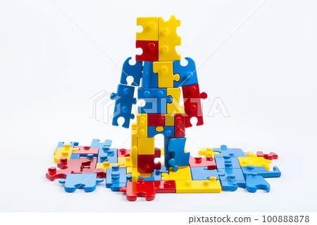 World Autism Awareness day. Abstract silhouette of a child from colorful puzzles. Generative AI illustration World Autism Awareness day. Abstract silhouette of a child from colorful puzzles. Generative AI illustration 100888878