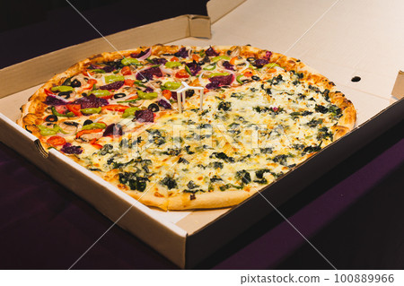 New York style pizzas takeout isolated in black background. New York style pizzas takeout isolated in black background. 100889966