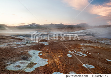 Boiling mudpots in Hverir geothermal area, Iceland 100892147