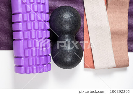 Sports equipment - massage roller, back ball and fabric fitness bands. 100892205