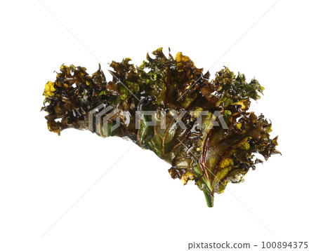 Tasty baked kale chip isolated on white 100894375