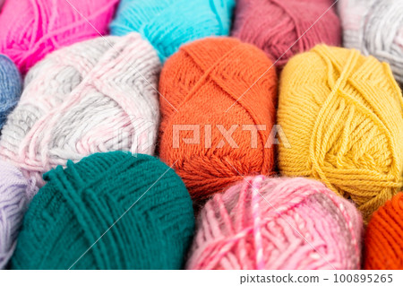 Stack of knitting yarn clews Stack of knitting yarn clews 100895265