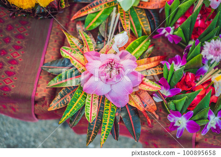 Loy Krathong festival, People buy flowers and candle to light and float on water to celebrate the Loy Krathong festival in Thailand 100895658