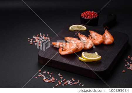 Tiger shrimp or langoustine boiled with spices and salt 100895684