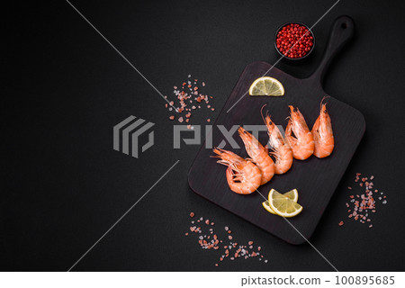 Tiger shrimp or langoustine boiled with spices and salt 100895685