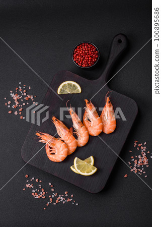 Tiger shrimp or langoustine boiled with spices and salt 100895686