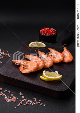 Tiger shrimp or langoustine boiled with spices and salt Tiger shrimp or langoustine boiled with spices and salt 100895687