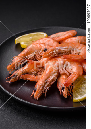 Tiger shrimp or langoustine boiled with spices and salt Tiger shrimp or langoustine boiled with spices and salt 100895697