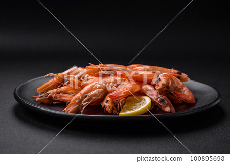 Tiger shrimp or langoustine boiled with spices and salt 100895698