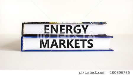Energy markets symbol. Concept words Energy markets on books. Beautiful white table white background. Business energy markets concept. Copy space. Energy markets symbol. Concept words Energy markets on books. Beautiful white table white background. Business energy markets concept. Copy space. 100896786