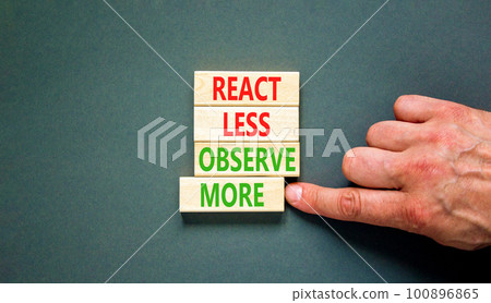 React less observe more symbol. Concept words React less observe more on wooden block. Beautiful grey table grey background. Motivational business react less observe more concept. Copy space. 100896865