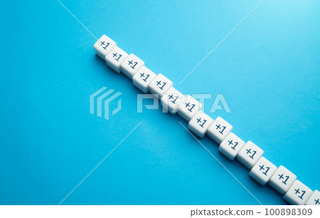 Growing line of blocks plus one. Sequence. Arithmetic progression. Sequential addition to the sum. Add one more. Increase and growth. A series concept. Accumulation process. Continuation 100898309