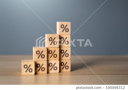 An increase in the interest rate. Loans and mortgages. Sale discounts and promotions. Cashback shopping bonus. Rising borrowing payments. Investment and economic growth 100898312