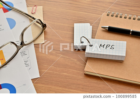 A desk with a word book written as MPS A desk with a word book written as MPS 100899585