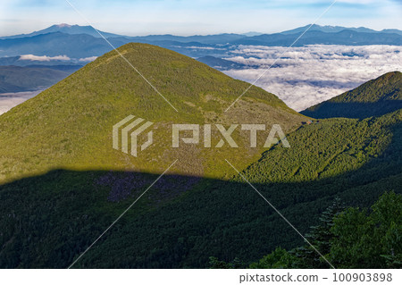 View of Mt.Amikasa, Youth hut, Mitake, and Mt. Norikura from Mitsugashira, Yatsugatake mountain range 100903898
