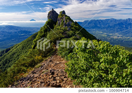 Mt. Fuji and Mt. Fuji at the summit of Yatsugatake Mountain Range and Gongendake Mt. Fuji and Mt. Fuji at the summit of Yatsugatake Mountain Range and Gongendake 100904714