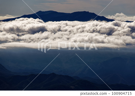 Mt. Kinpu and the sea of clouds from the summit of Mt. Yatsugatake and Mt. Gongen Mt. Kinpu and the sea of clouds from the summit of Mt. Yatsugatake and Mt. Gongen 100904715