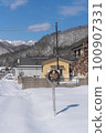 Snowy winter bus stop sign 100907331