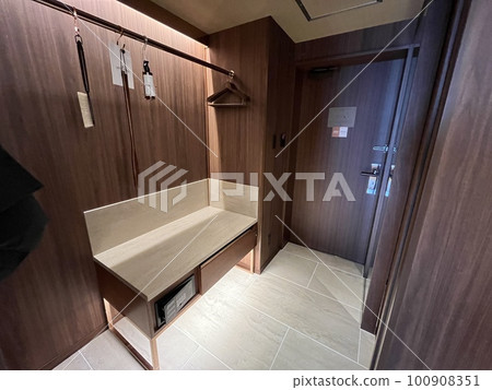 Closet at the entrance of a business hotel guest room Closet at the entrance of a business hotel guest room 100908351