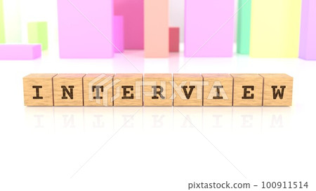 A wooden block printed with the words INTERVIEW 100911514