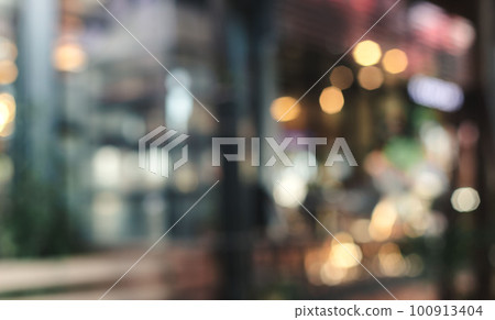 Blur cafe with light bulb background. coffee shop or cafe restaurant with abstract bokeh photo background. Blur cafe with light bulb background. coffee shop or cafe restaurant with abstract bokeh photo background. 100913404