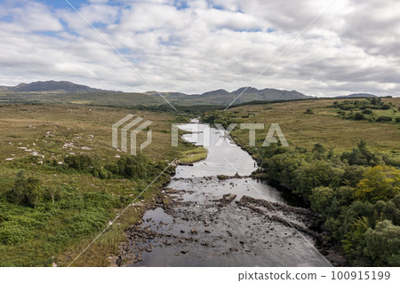 Aerial view of the Lackagh river close to Doe Castle by Creeslough in County Donegal, Republic of Ireland 100915199