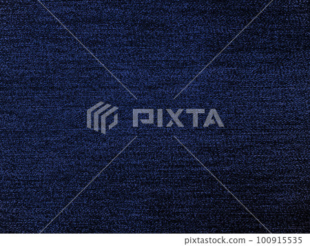 A background image of dark and dark navy blue plain denim fabric texture A background image of dark and dark navy blue plain denim fabric texture 100915535
