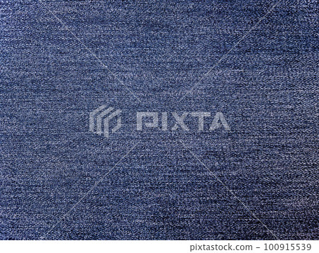 A background image of a light navy blue plain denim fabric texture 100915539