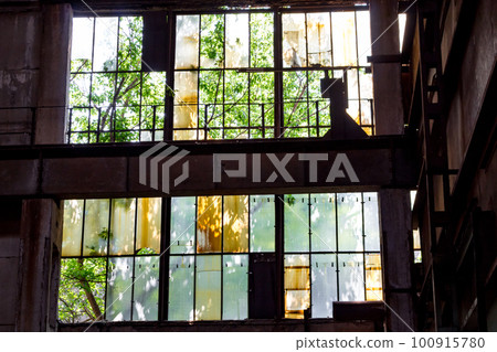 Broken windows in the old Industrial factory Broken windows in the old Industrial factory 100915780