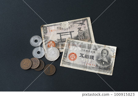 Old bills and old coins Old bills and old coins 100915823