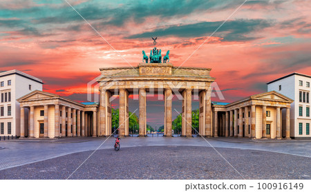 Famous Panorama of Brandenburg Gate or Brandenburger Tor at sunrise, Berlin, Germany 100916149