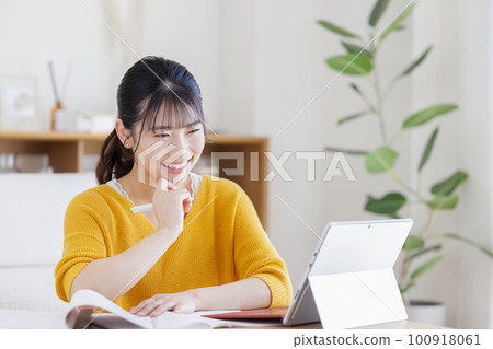 A young woman studying 100918061