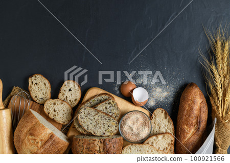 slide multi grain sourdough bread and sliced Baguette with Whole Wheat Flour 100921566