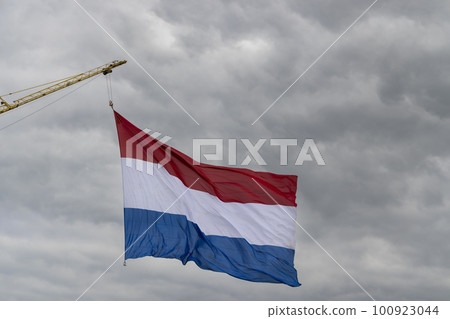 Dutch flag hoisted on a national holiday Dutch flag hoisted on a national holiday 100923044