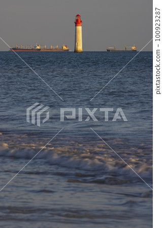 Phare de Chauvea near Ile de Re with ships to La Rochelle, Pays de la Loire, France 100923287