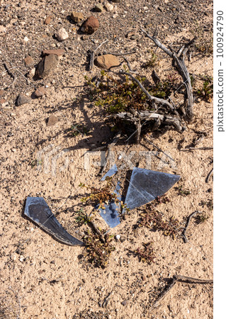 Broken blue glass in the nature, Spain Broken blue glass in the nature, Spain 100924790