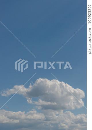 Cover page with soft blue sky with illuminated clouds as a background. Cover page with soft blue sky with illuminated clouds as a background. 100925202