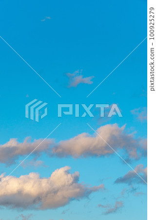Cover page with soft blue sky with illuminated clouds as a background. Cover page with soft blue sky with illuminated clouds as a background. 100925279