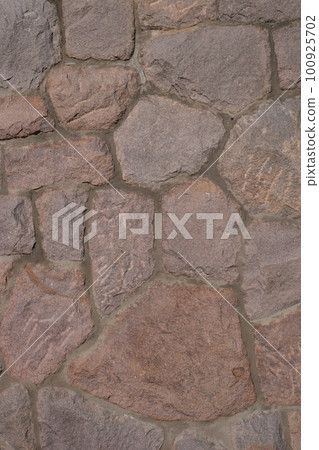 Pattern of ancient bricks and stones at old middle age wall, as a background, closeup, details. Pattern of ancient bricks and stones at old middle age wall, as a background, closeup, details. 100925702